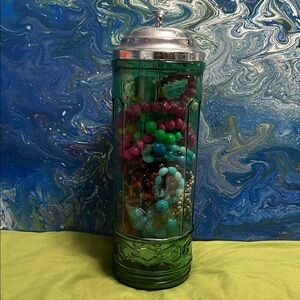 Green and Silver Decorative Jar with Mixed necklaces to brighten up your outfit.